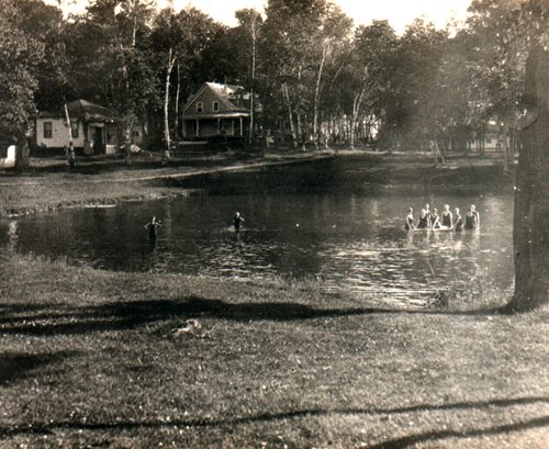 Swimmers on the shore of Stanley Island, near Cornwall, Ontario