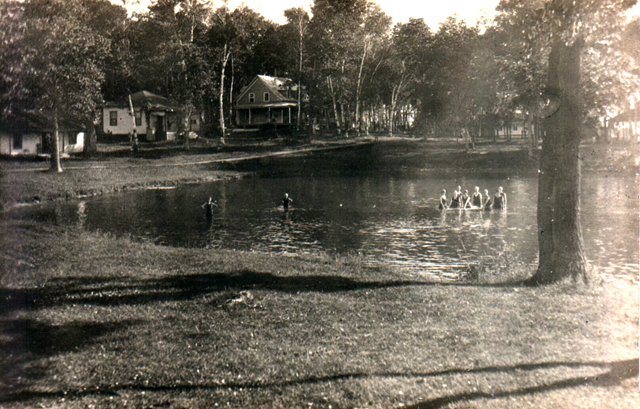 Swimmers on the shore of Stanley Island, near Cornwall, Ontario