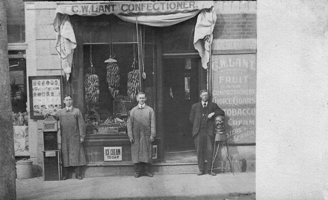 Close-up of C.W. Lant and his store, Cornwall, Ontario