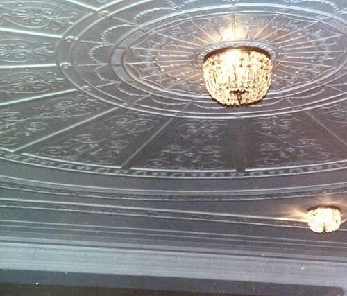 The ceiling with chandeliers.