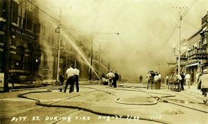 Firefighters With Their Hoses are Seen Here at the Front of the Buildings, Cornwall, Ontario, 1933