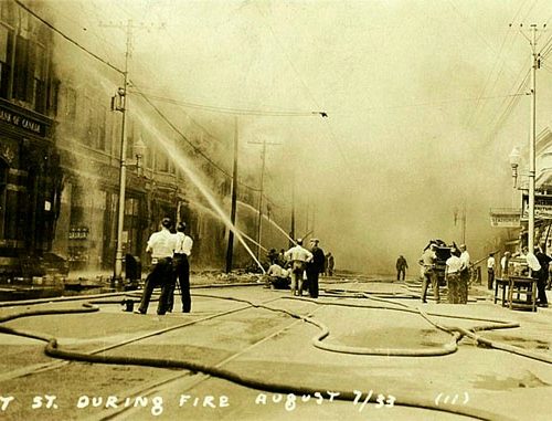 Firefighters With Their Hoses are Seen Here at the Front of the Buildings, Cornwall, Ontario, 1933