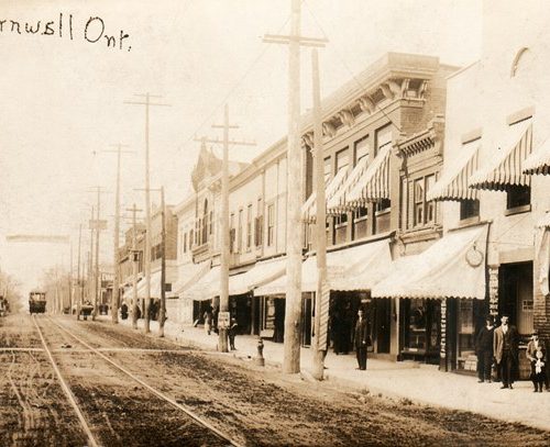 Colourful awnings, some striped, on Pitt Street, Cornwall, Ontario