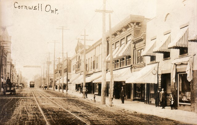 Colourful awnings, some striped, on Pitt Street, Cornwall, Ontario