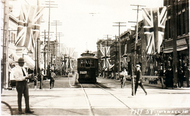 Excited crowd on Pitt Street. Cornwall, Ontario