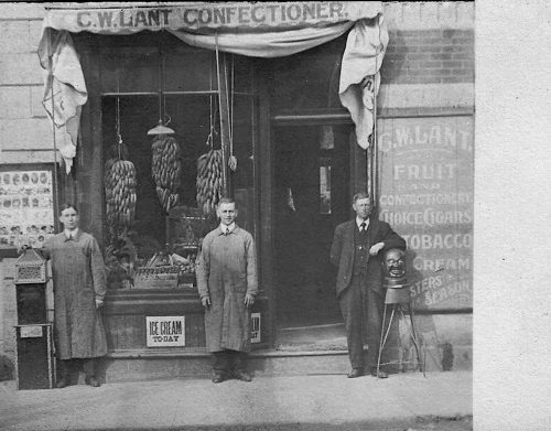 Close-up of C.W. Lant and his store, Cornwall, Ontario