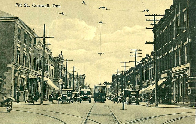 Early traffic on Pitt near First Street. Cornwall, Ontario